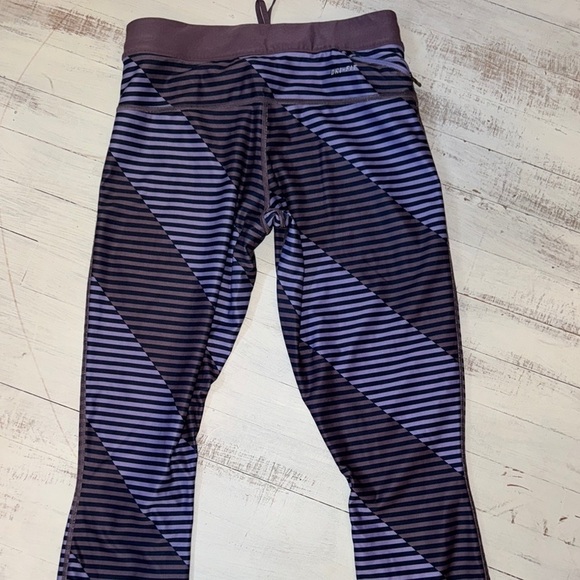 Nike Black and Purple Leggings with Reflective Accents - Picture 6 of 9